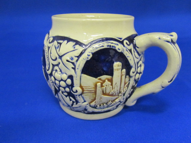 Highly collectable white and cobalt Beer stein